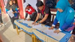 KET: Penandatangan komitmen bersama antara UPT Puskesmas Waisai dan pihak SDN 02 Raja Ampat guna mewujudkan Kawasan Tanpa Rokok/dok. UPT Puskesmas Waisai