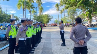 Polres Raja Ampat Kerahkan Puluhan Personel Amankan Lomba Gerak Jalan HUT ke-23 Kabupaten Raja Ampat